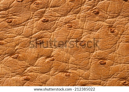 Closeup of seamless beige leather texture for background
