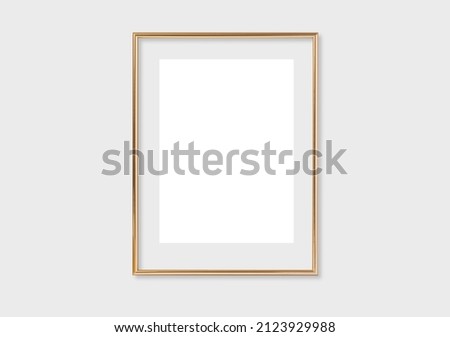 The layout of the frame is 3x4, 30x40. Layout with one gold frame. Clean, modern, minimalistic, bright. Portrait. Vertical. Royalty-Free Stock Photo #2123929988