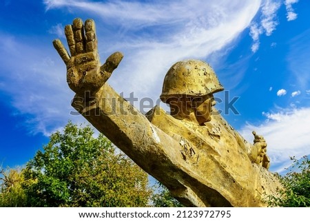 Element of an old monument to a soldier. Stop war and aggression concept. Background with copy space for text