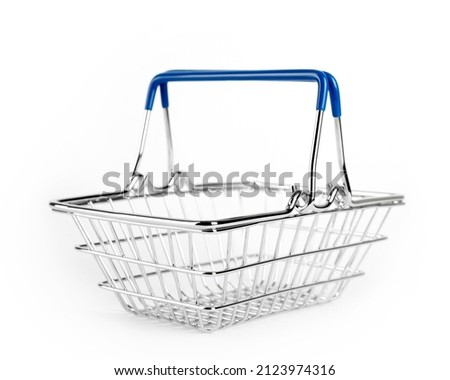Empty shopping basket isolated on white background. Retail store equipment. The concept of marketing and buying consumer goods