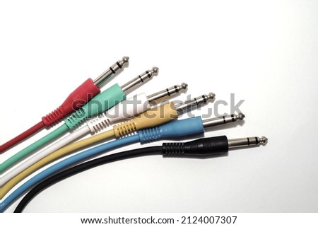multi color 6,35 stereo jack cables wires , white background