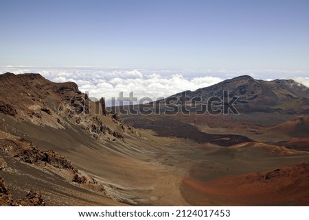 A beautiful view of Haleakala crater with cloudy sky background in Hawaii