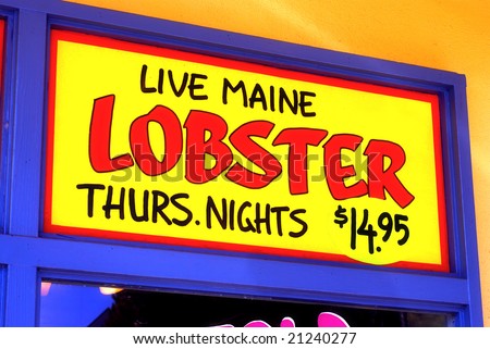 "Live Maine Lobster Thursday Nights $14.95" sign hand painted on a restaurant window