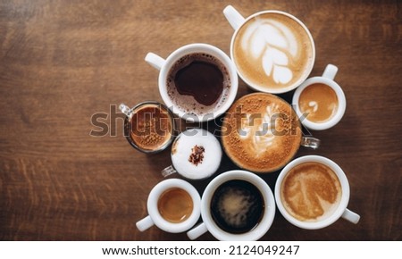 Coffee time. Aerial view of different types of coffee Royalty-Free Stock Photo #2124049247