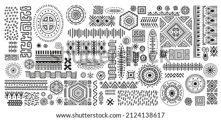 Black and white African art decoration tribal geometric shapes set. Pen and ink drawing of ancient ethnic traditional symbols and ornate signs. Hand-drawn oriental elements in doodle style. Royalty-Free Stock Photo #2124138617