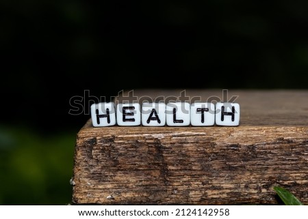 The mote block alphabet is set to write "health".