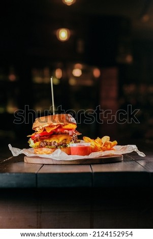 burger with fries and sauce