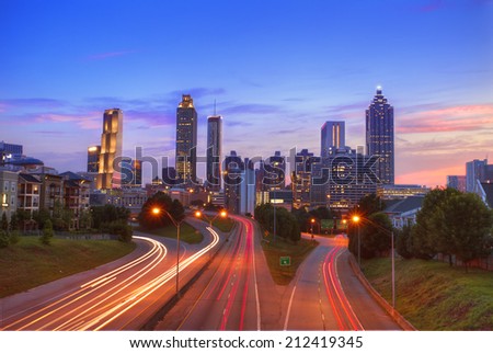 The best Atlanta Downtown overlook at dusk with traffic flow and blue sky red cloud/Atlanta downtown at dusk