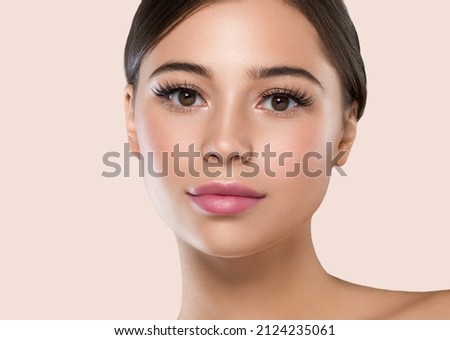 Beautiful freckles woman healthy skin, hair brunette hairstyle concept. Color background.