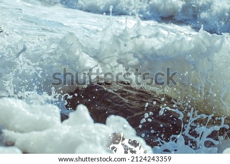 Waves on the black sea, sunny day, beautiful sea foam Royalty-Free Stock Photo #2124243359