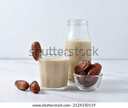 Susu Kurma or Smoothie Dates made from milk and dates or palm fruits. Popular as a Suhoor menu during Ramadan, important to give us energy while fasting. Royalty-Free Stock Photo #2124330119
