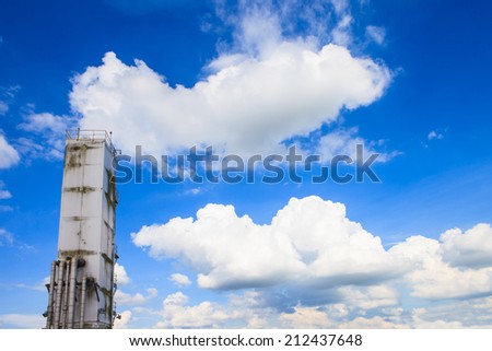 refinery against a blue sky