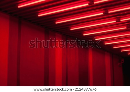 Wall with neon red lights Royalty-Free Stock Photo #2124397676