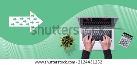 Top view of hands using laptop with symbol of influencer concept
