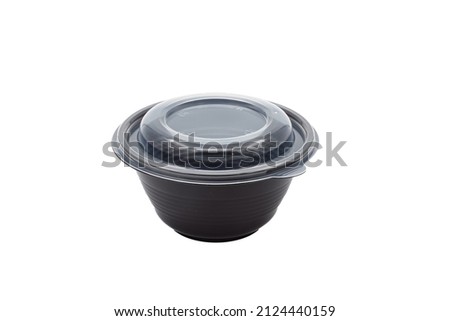 Plastic, muffle, black bowl on a white background