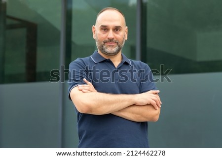 Portrait of a middle-aged man. Mature man 50 years old looking at the camera. Royalty-Free Stock Photo #2124462278