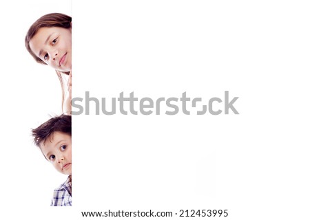 Kids holding a white board for text or image, isolated on white background