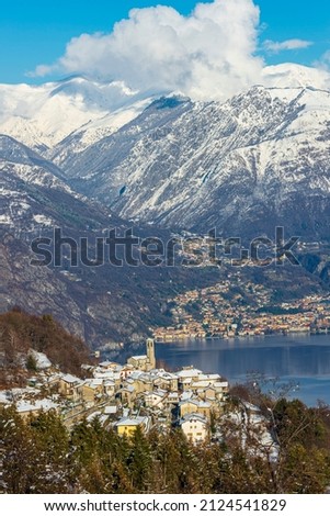 Winter landscape of the Alps and Lake Lugano from the Intelvi Valley. Location Ramponio. Province of Como. Lombardy. Italy