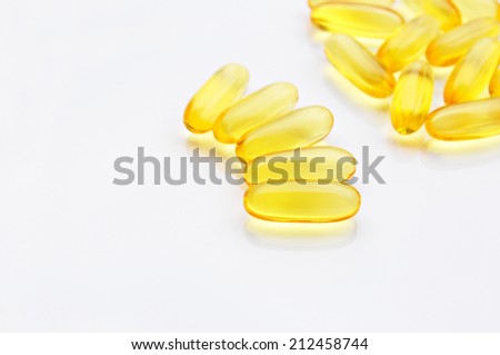 Cod liver oil omega 3 gel capsules isolated  on White background