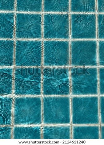 A colourful background with water