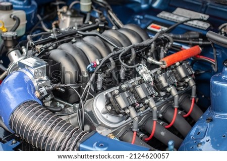 V8 under the bonnet of performance car Royalty-Free Stock Photo #2124620057