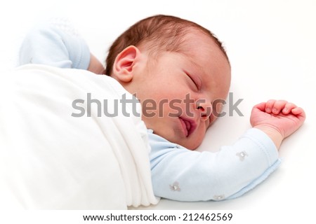 Newborn baby boy sleeping. Newborn Sleep. Two weeks old Royalty-Free Stock Photo #212462569