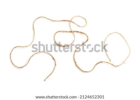 Piece of jute twine isolated on white background. Natural rope for packaging and decoration. Coarse linen threads. Hemp twine. Royalty-Free Stock Photo #2124652301