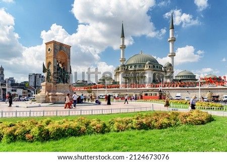 Awesome view of the Taksim Mosque and the Republic Monument at the Taksim Square on sunny day. The public square is a popular tourist destination. Royalty-Free Stock Photo #2124673076