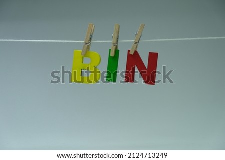 Word 'Bin' on white background. The meaning of BIN is a box, frame, crib, or enclosed place used for storage.
