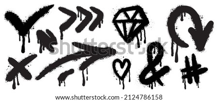 Set of black graffiti spray. Collection of arrow, dot, diamond, heart and symbols with spray texture and stencil pattern. Elements on white background for banner, decoration, street art and ads. Royalty-Free Stock Photo #2124786158