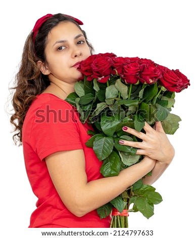 Girl with a bouquet of red roses isolated on a white background.