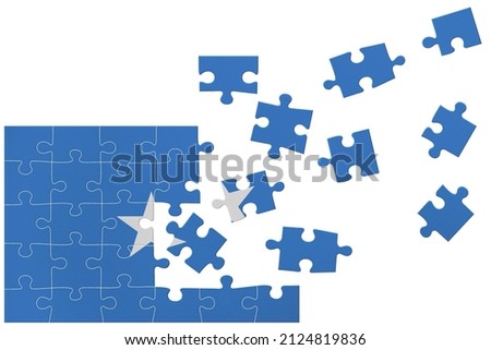 Broken puzzle- game background in colors of national flag. Somalia