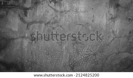 Horizontal dark old cement wall for the background, Texture of a grungy black concrete wall as background for wallpaper decorative design.