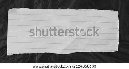 ripped paper isolated on black background. Royalty-Free Stock Photo #2124858683
