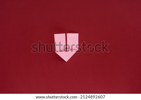 How to make a paper bookmark for congratulations, confession in lovein and fun on Valentine's Day. DIY concept. Photo instruction. Step 4.1. On both sides, we bend the edges at the same time. Back vie