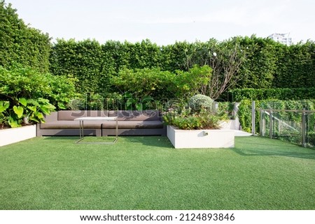 Modern Sofa and furniture on rooftop garden. Royalty-Free Stock Photo #2124893846