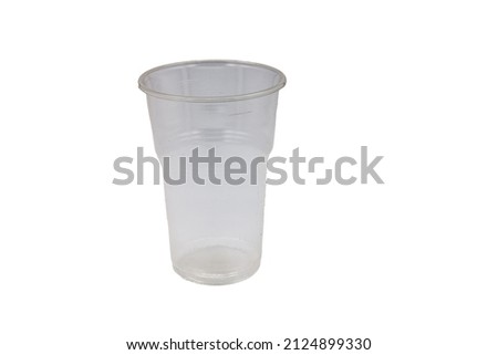 Large, transparent, plastic glass for beer on a white background