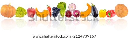 Colorful vegetables and fruits in row with light reflection isolated on white background.