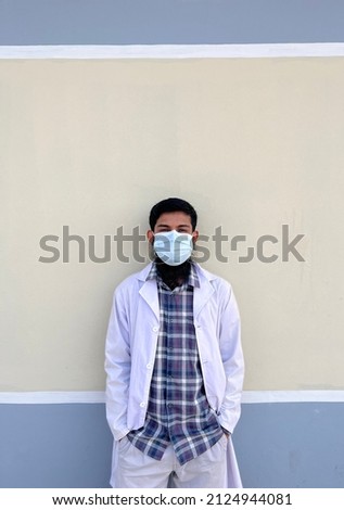 A Male Medical Student Wearing Face Mask for Protection Against COVID-19, Current Global PANDEMIC.
Device: iPhone 13 Pro