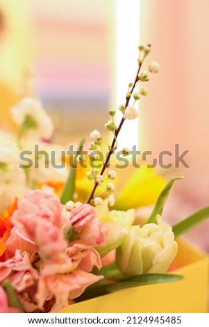 Flowers composition in box yellow and pink