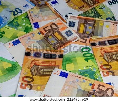 concept background of colorful euro cash banknotes close up , money backdrop for design
