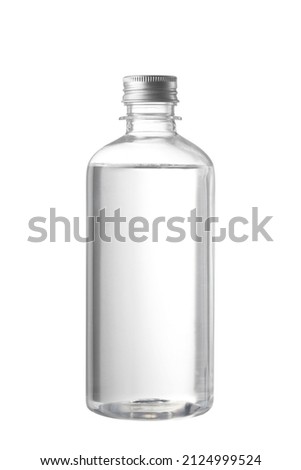 clear plastic bottle with liquid on white background, Round bottle Royalty-Free Stock Photo #2124999524