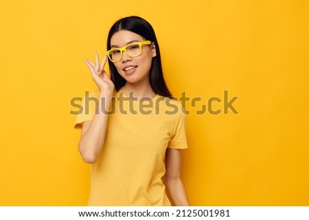 woman with Asian appearance hands gesture emotions cropped view isolated background unaltered