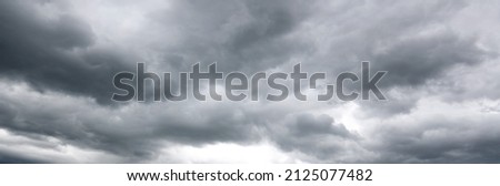 Grey storm clouds in sky wide banner Royalty-Free Stock Photo #2125077482