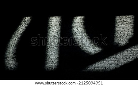 abstract design of shadows and light on window blind written symbols textured lines dark and light contrast black and white abstract textured background backdrop or wallpaper of symbols room for type