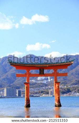 Torii Gate of Miyajima, Japan with blue sky Royalty-Free Stock Photo #212511310
