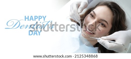 Young woman visiting dentist in clinic. World Dentist Day Royalty-Free Stock Photo #2125348868