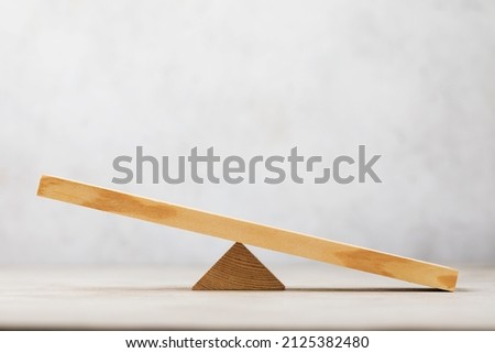 Wooden swing or scales on an abstract background, a template for the designer Royalty-Free Stock Photo #2125382480