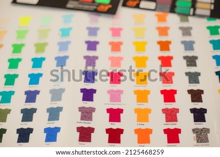 T-shirt color selection for marketing advertising business textile fabric cloth production. Digital film craft. Close up