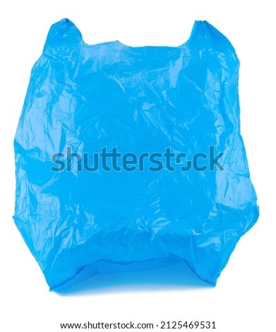 Blue plastic bag, empty purchases on a white background. Object is isolated on white background without shadows. Plastic bags are the cause of major environmental concerns